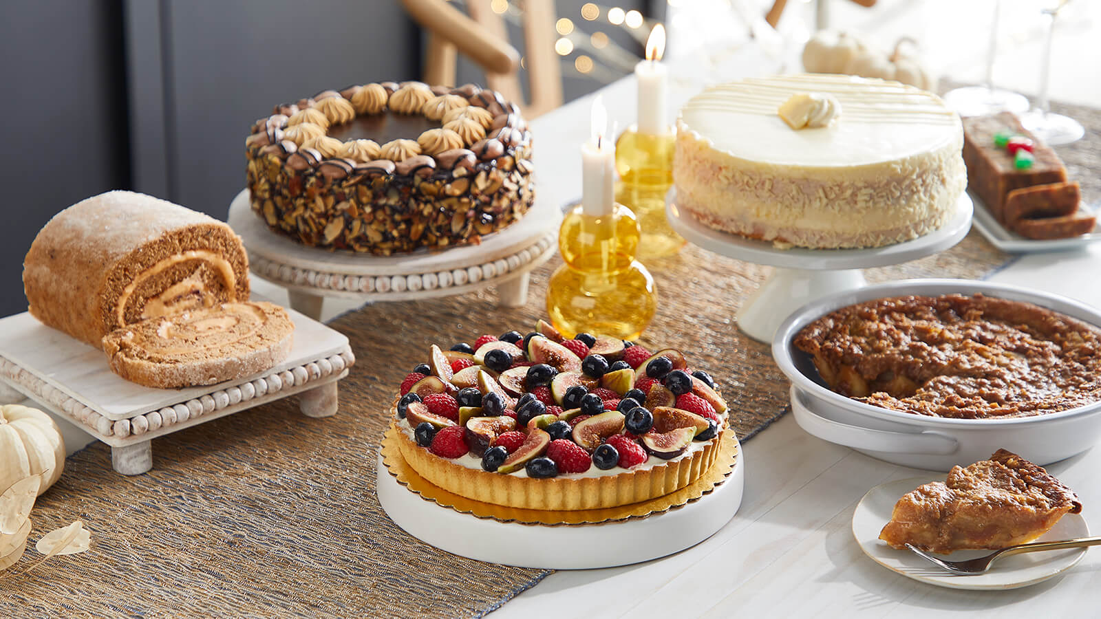 table with different types of cakes